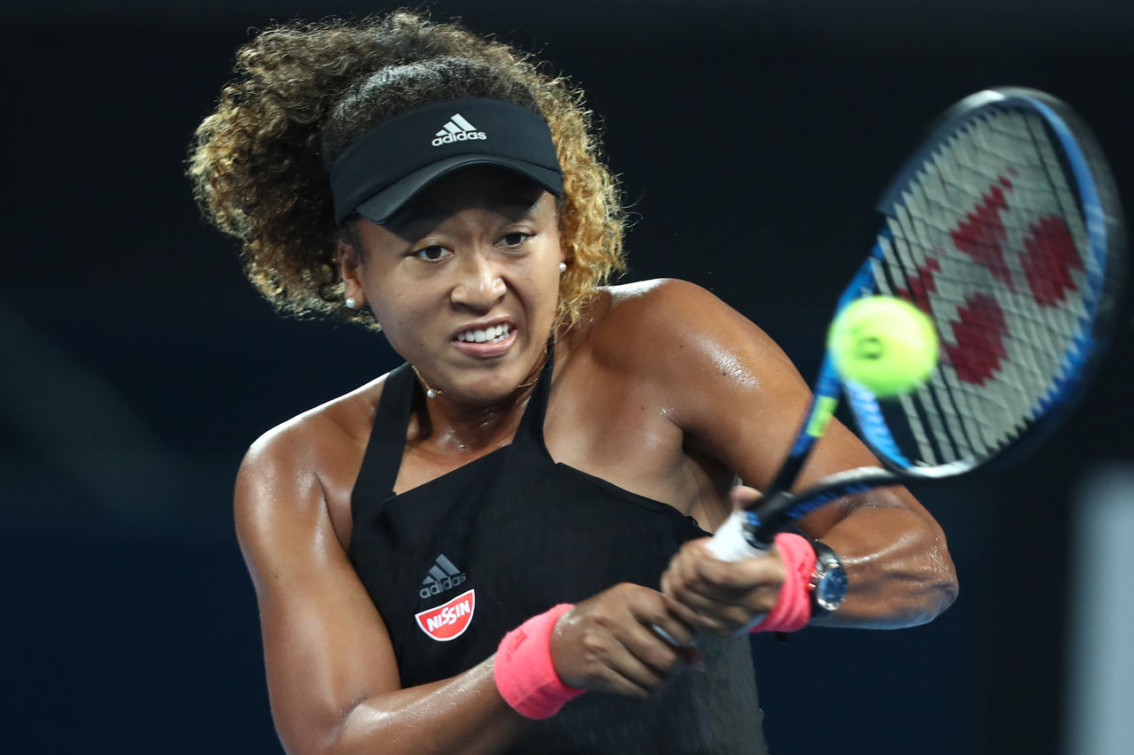 BRISBANE, AUSTRALIA - JANUARY 01: Naomi Osaka of Japan plays a backhand in her match against Destanee Aiava of Australia during day three of the 2019 Brisbane International at Pat Rafter Arena on January 01, 2019 in Brisbane, Australia. (Photo by Chris Hyde/Getty Images)