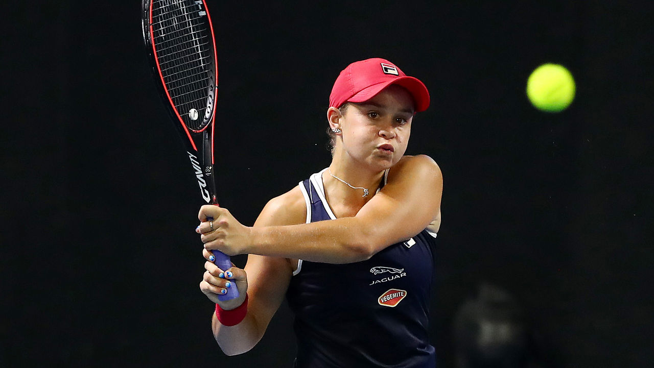 BRISBANE, AUSTRALIA - JANUARY 06: Ashleigh Barty of Australia plays a backhand in her doubles match partnered with Kiki Bertens against Anastasia Pavlyuchenkova and Anett Kontaveit during day one of the 2020 Brisbane International at Pat Rafter Arena on January 06, 2020 in Brisbane, Australia. (Photo by Chris Hyde/Getty Images)