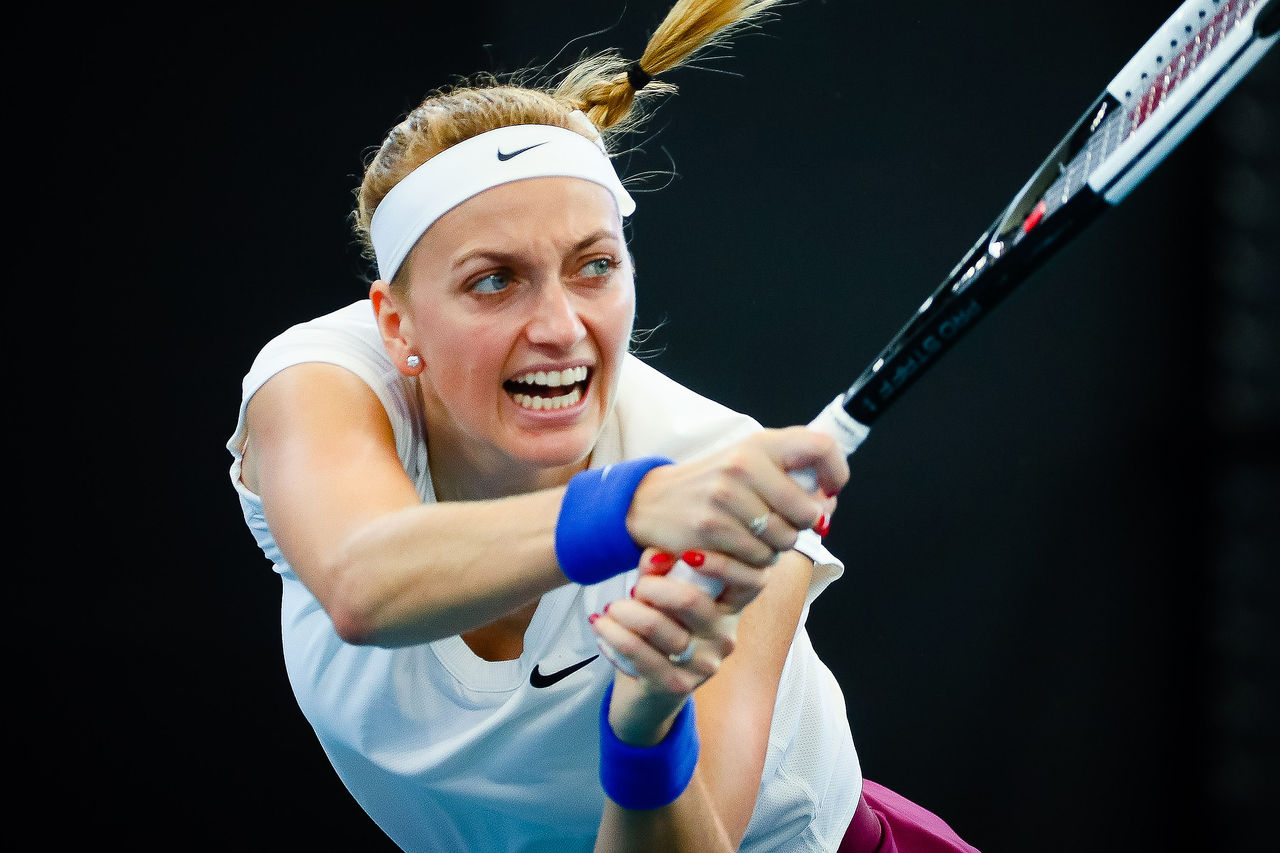 Petra Kvitova of Czech Republic hits a return to Liudmila Samsonova of Russia during the women's singles match in the Brisbane International tennis tournament in Brisbane on January 9, 2020. (Photo by Patrick HAMILTON / AFP) / -- IMAGE RESTRICTED TO EDITORIAL USE - STRICTLY NO COMMERCIAL USE -- (Photo by PATRICK HAMILTON/AFP /AFP via Getty Images)
