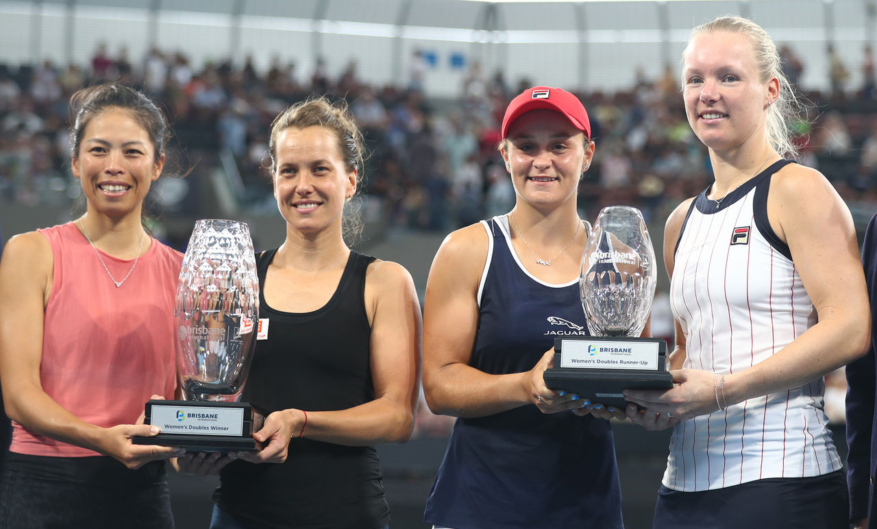 BRISBANE, AUSTRALIA - JANUARY 12: Hsieh Su-wei of Taiwan and Strycova Barbora of the Czech Republic hold the doubles winnners trophy after the final match against Ashleigh Barty of Australia and Kiki Bertens of the Netherlands during day seven of the 2020 Brisbane International at Pat Rafter Arena on January 12, 2020 in Brisbane, Australia. (Photo by Chris Hyde/Getty Images)