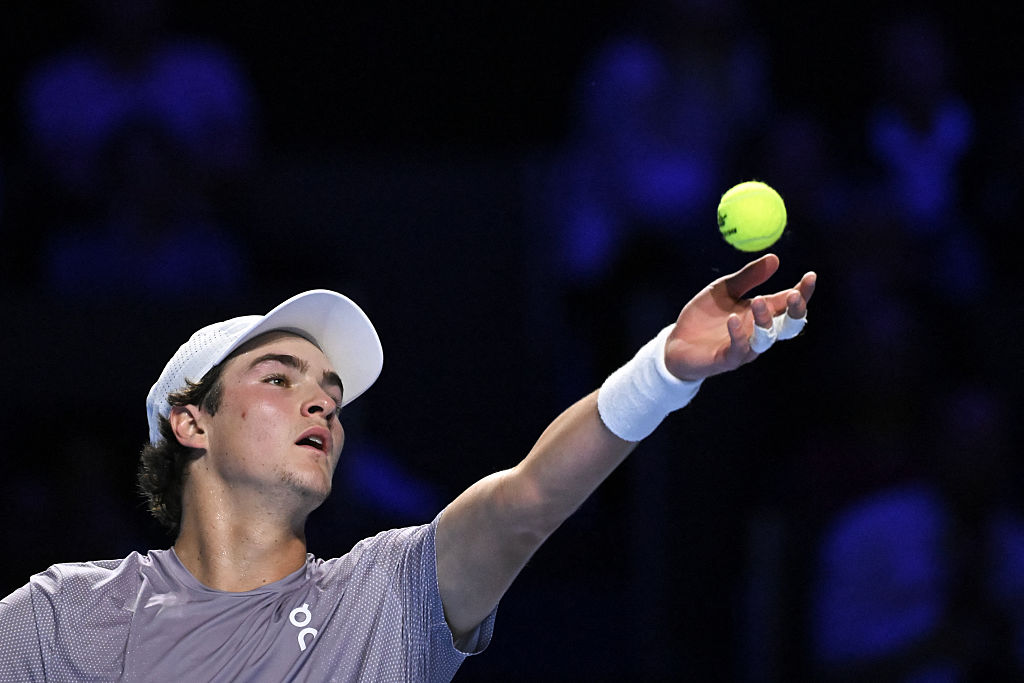 Brazil's Joao Fonseca serves to Spain's Jaume Munar during their men's semi final match at the Swiss Indoors ATP 500 tennis tournament in Basel on October 25, 2025. (Photo by Fabrice COFFRINI / AFP) (Photo by FABRICE COFFRINI/AFP via Getty Images)          