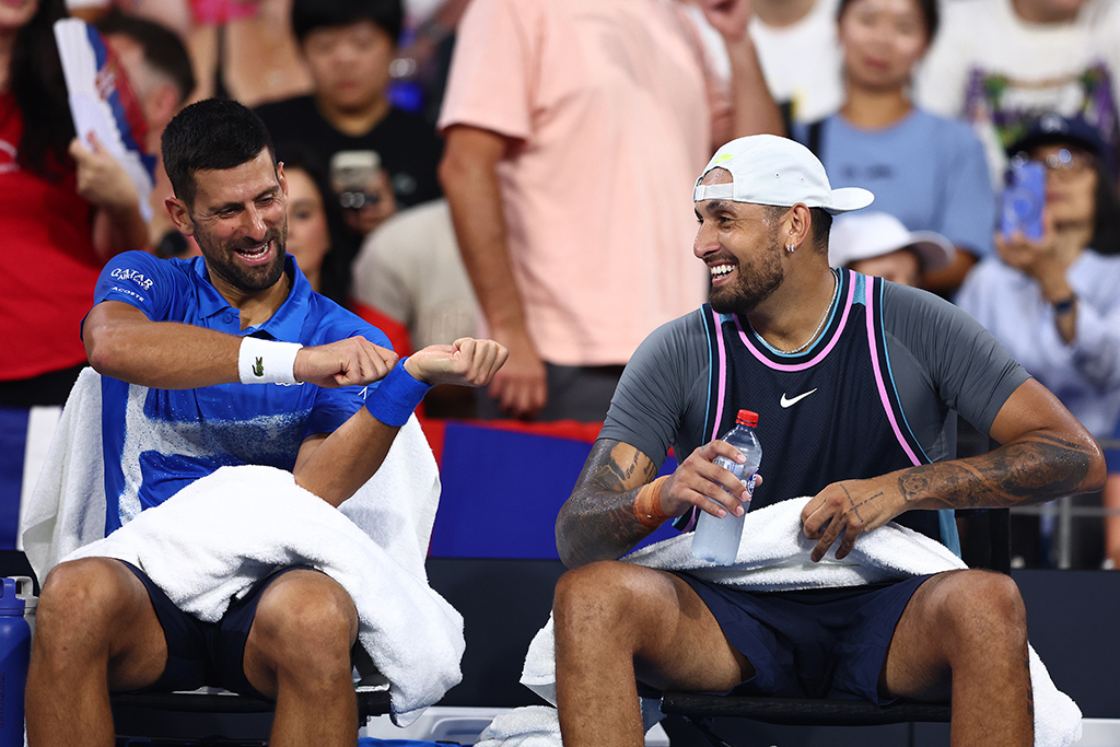 BRISBANE, AUSTRALIA - DECEMBER 30: Novak Djokovic and Nick Kyrgios talk during the Men's Doubles match against Andreas Mies and Alexander Erler during day two of the 2025 Brisbane International at Pat Rafter Arena on December 30, 2024 in Brisbane, Australia. (Photo by Chris Hyde/Getty Images)
