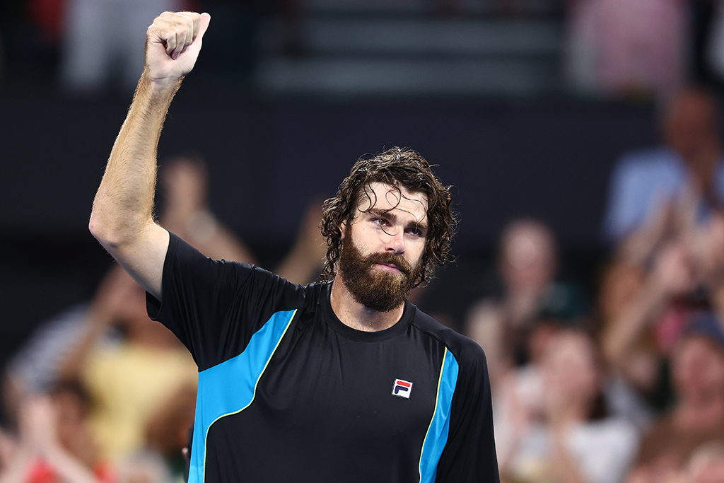BRISBANE, AUSTRALIA - JANUARY 03: Reilly Opelka of the USA  celebrates winning his quarter-final match against Novak Djokovic of Serbia during day six of the 2025 Brisbane International at Pat Rafter Arena on January 03, 2025 in Brisbane, Australia. (Photo by Chris Hyde/Getty Images)