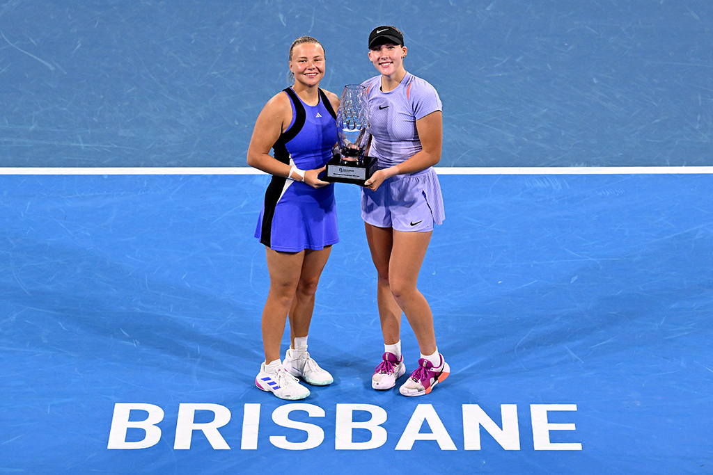 BRISBANE, AUSTRALIA - JANUARY 04: Mirra Andreeva and Diana Schneider celebrate victory as they pose for a photo after winnning the Women’s doubles finals match against Priscilla Hon and Anna Kalinskaya during day seven of the 2025 Brisbane International at Pat Rafter Arena on January 04, 2025 in Brisbane, Australia. (Photo by Bradley Kanaris/Getty Images)
