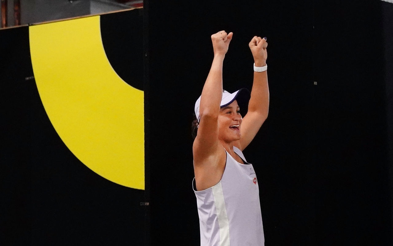 Ashleigh BARTY (AUS) celebrates as her team recovers a lost football that was kicked over a wall before her match against Shelby ROGERS (USA) on Rod Laver Arena during Day 8 of the Australian Open at Melbourne Park on Monday, February 15, 2021.MANDATORY PHOTO CREDIT Tennis Australia/ Scott Barbour