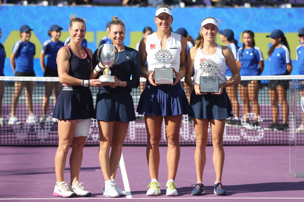 CANCUN, MEXICO - NOVEMBER 06: (L to R) Champions Laura Siegemund of Germany and Vera Zvonareva pose with runners up Nicole Melichar-Martinez of the United States and Ellen Perez of Australia after the doubles final during the final day of the GNP Seguros WTA Finals Cancun 2023, part of the Hologic WTA Tour, on November 06, 2023 in Cancun, Mexico. (Photo by Matthew Stockman/Getty Images)
