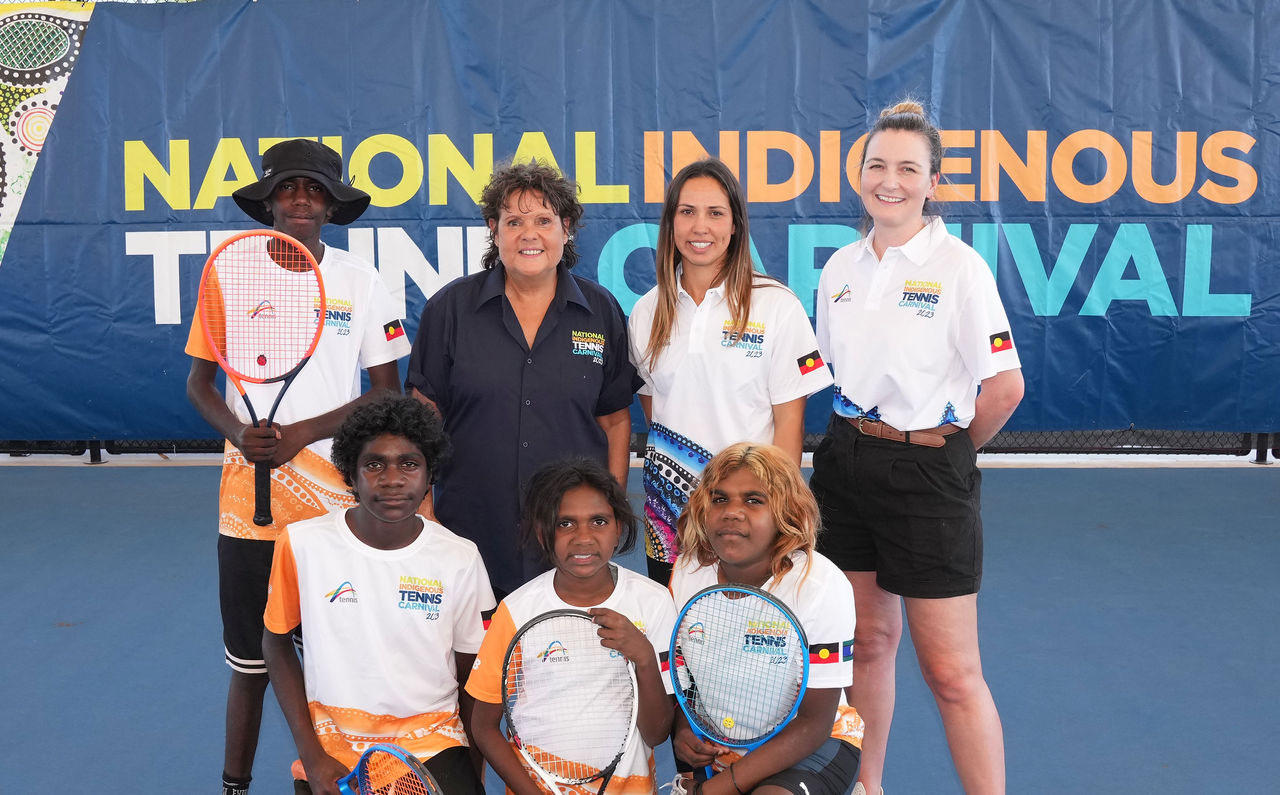 Evonne Goolagong Cawley poses with children at the Darwin International Tennis Centre for the National Indigenous Tennis Carnival on Thursday, August 10, 2023. MANDATORY PHOTO CREDIT Tennis Australia/ SCOTT BARBOUR