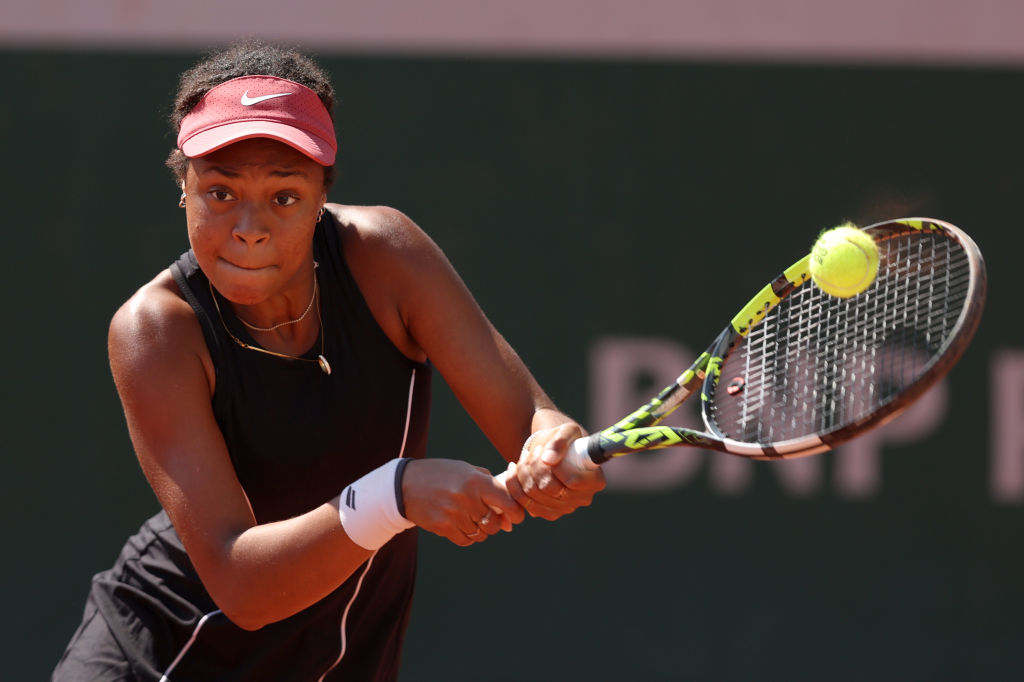 PARIS, FRANCE - JUNE 04: Lily Taylor of Australia plays a backhand against Alevtina Ibragimova during the Girls Junior Singles First Round match on Day Eight of the 2023 French Open at Roland Garros on June 04, 2023 in Paris, France. (Photo by Clive Brunskill/Getty Images)