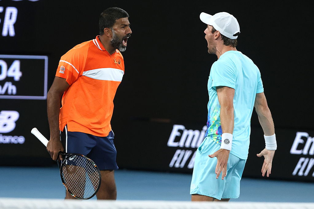 January 25: Rohan Bopanna (IND) and Matthew Ebden (AUS) celebrate victory over Tomas Machac (CZE) and Zhizhen Zhang (CHN) on Rod Laver Arena during the 2024 Australian Open on Thursday, January 25, 2024. Photo by TENNIS AUSTRALIA/ HAMISH BLAIR