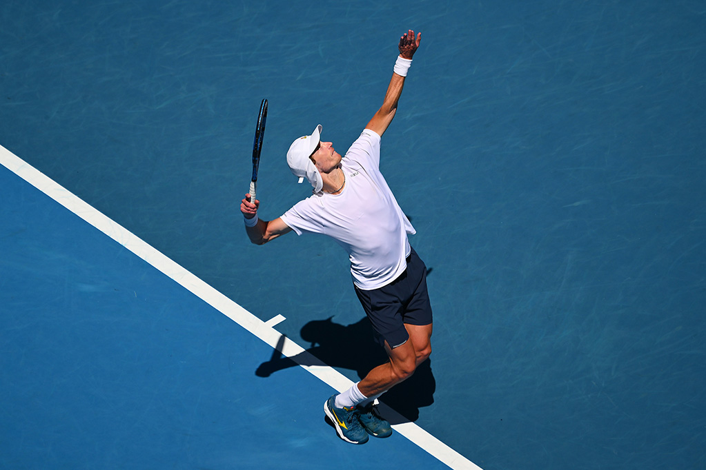 MELBOURNE, AUSTRALIA - JANUARY 15: Marc Polmans of Australia serves in their round one singles match against Alexei Popyrin of Australia during the 2024 Australian Open at Melbourne Park on January 15, 2024 in Melbourne, Australia. (Photo by Morgan Hancock/Getty Images)