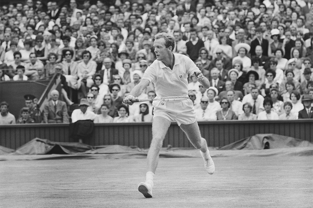 Australian tennis player Fred Stolle plays Chuck McKinley in the final of the Men's Singles during the Wimbledon Championships in London, UK, 5th July 1963. He lost to McKinley.  (Photo by Evening Standard/Hulton Archive/Getty Images)