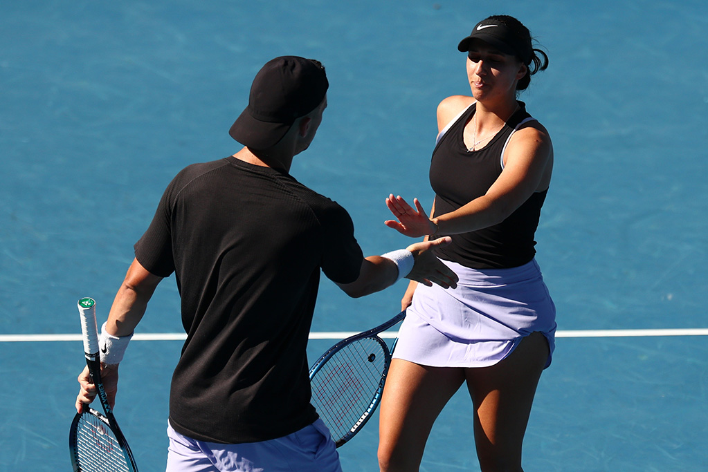 MELBOURNE, AUSTRALIA - JANUARY 23: Jaimee Fourlis and Andrew Harris of Australia celebrate a point in their quarterfinals mixed doubles match against Laura Siegemund of Germany and Sander Gille of Belgium during the 2024 Australian Open at Melbourne Park on January 23, 2024 in Melbourne, Australia. (Photo by Graham Denholm/Getty Images)