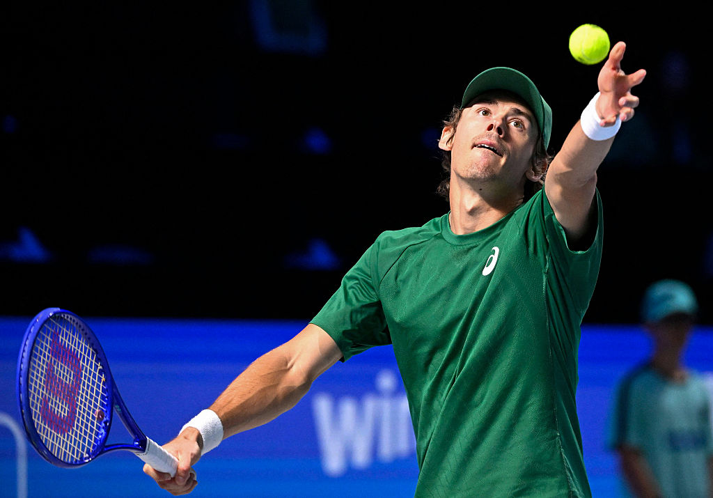 Australia's Alex de Minaur serves the ball to Italy's Matteo Berrettini during their men's quarter-final singles match at the ATP Vienna Open tennis tournament in Vienna, Austria, on October 24, 2025. (Photo by HELMUT FOHRINGER / APA / AFP) / Austria OUT (Photo by HELMUT FOHRINGER/APA/AFP via Getty Images)          