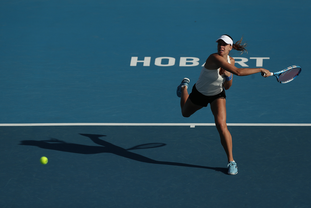 HOBART, AUSTRALIA - JANUARY 13: Magda Linette of Poland plays a forehand during her first round singles match against Svetlana Kuznetsova of Russia during day three of the 2020 Hobart International at Domain Tennis Centre on January 13, 2020 in Hobart, Australia. (Photo by Mark Metcalfe/Getty Images)